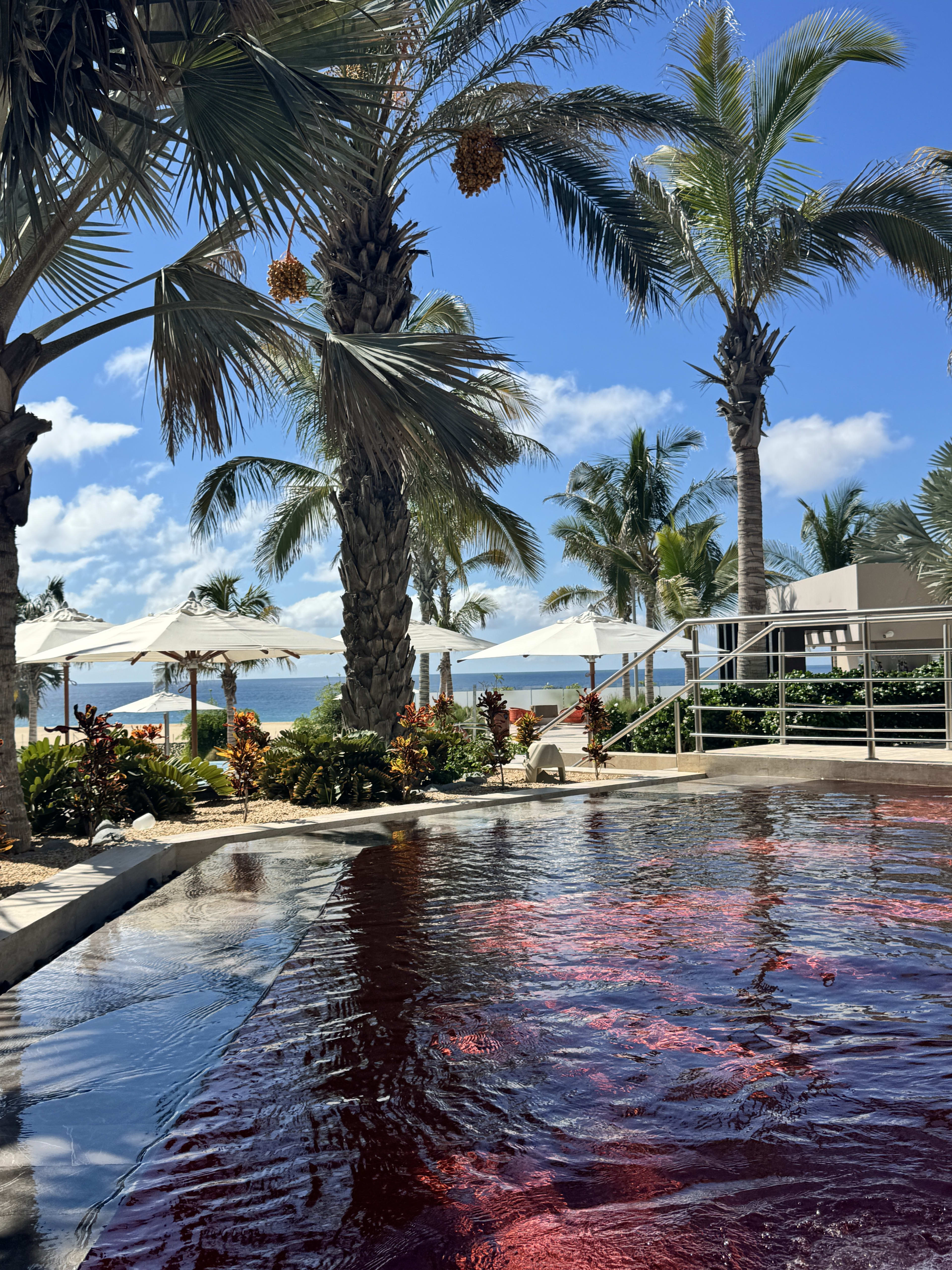 Relax at the pool with a view of the beach at Hard Rock Los Cabos.