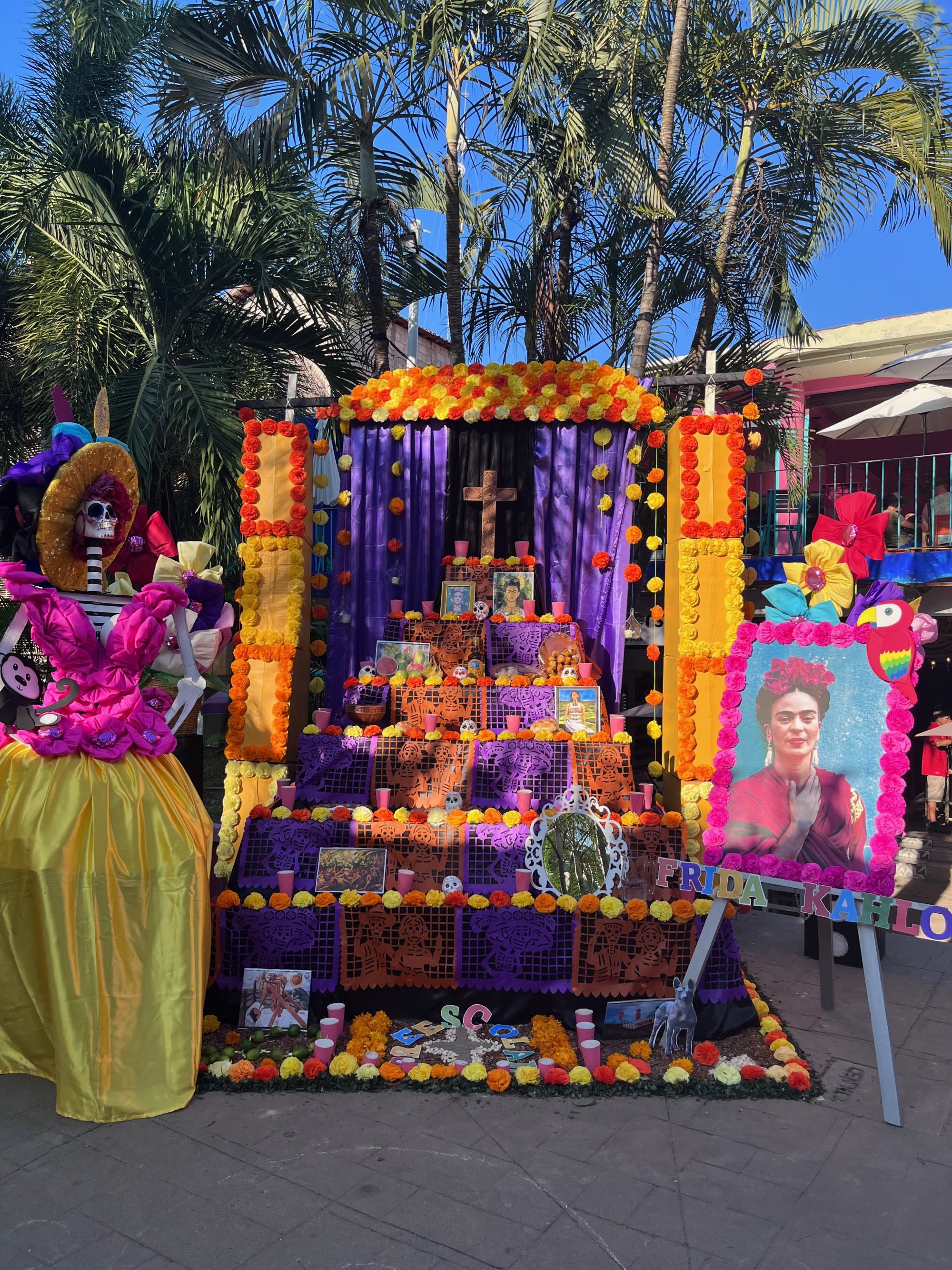A colorful cultural display set up outside during the daytime