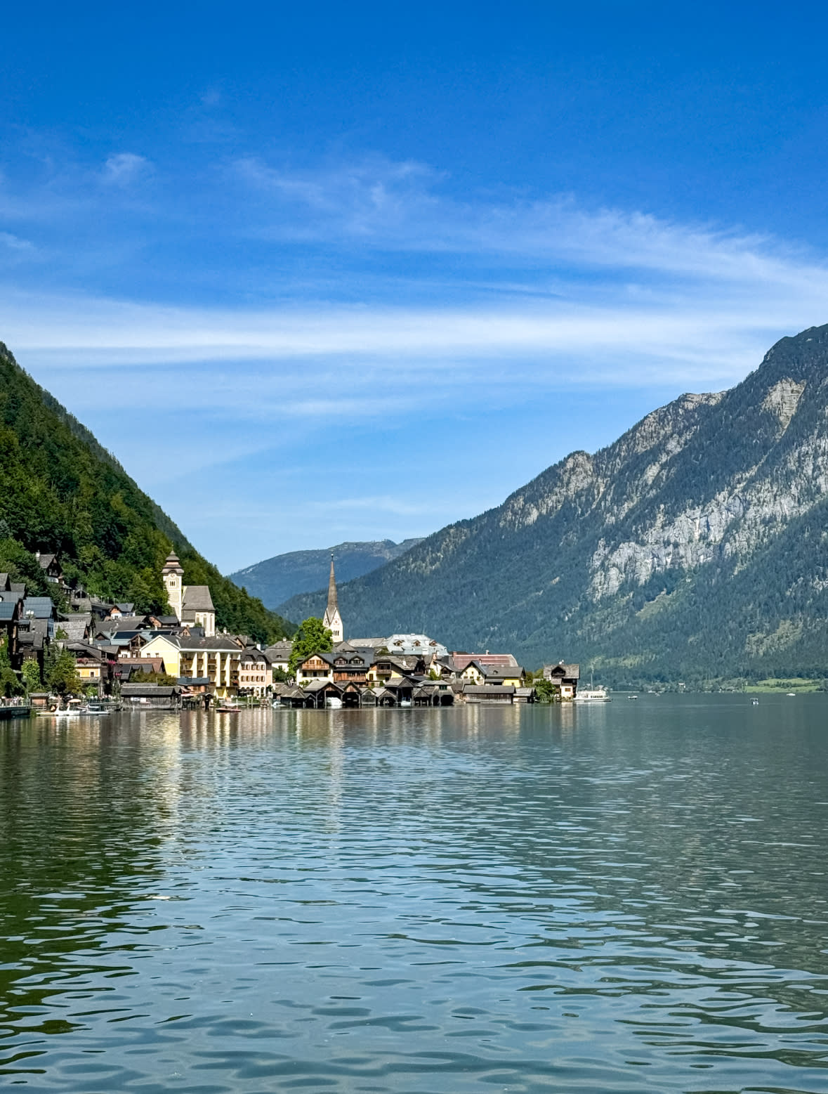 Hallstatt is a picturesque Austrian village known for its stunning alpine lake, ancient salt mines and charming medieval architecture.