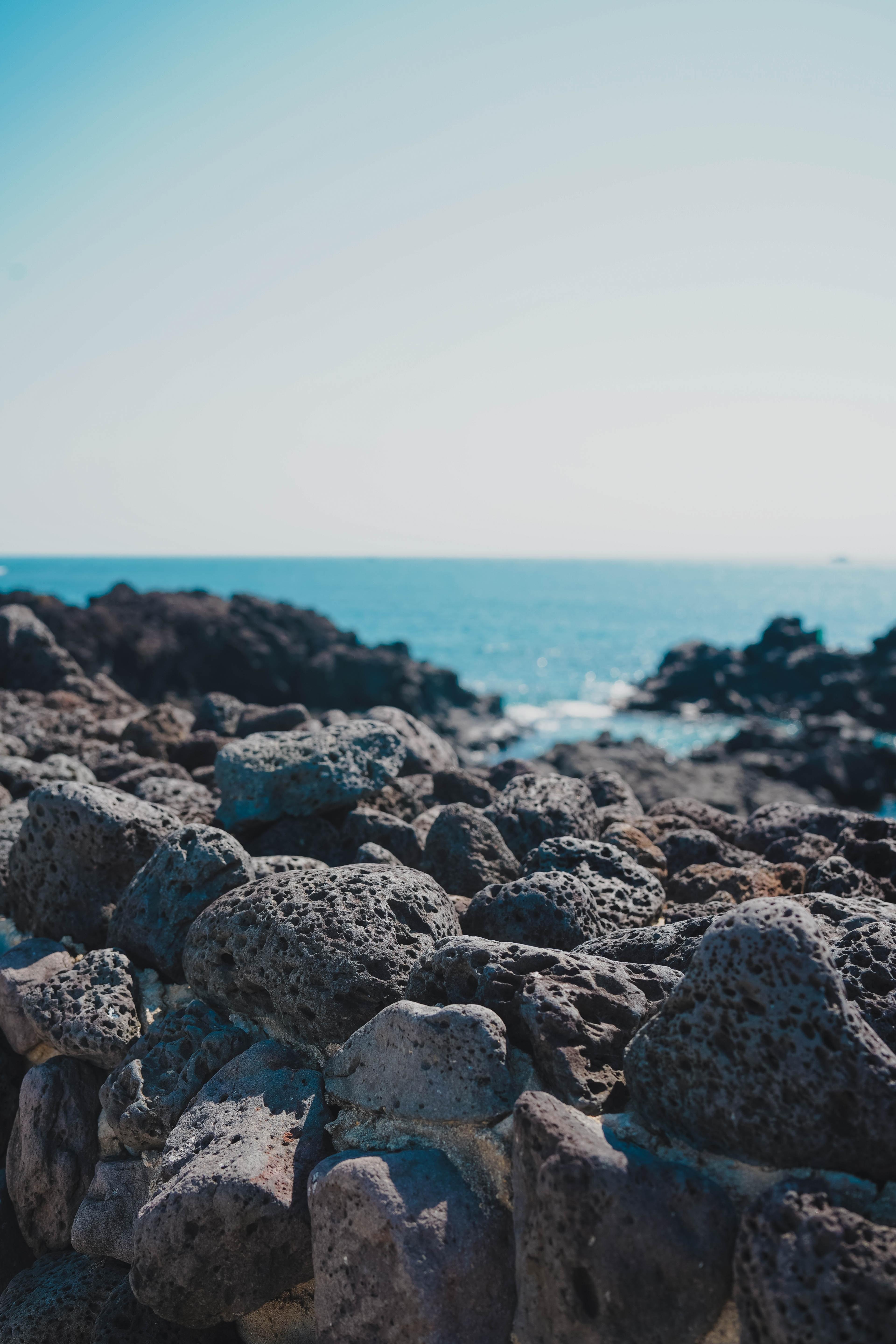 Jeju black rocks and beach.
