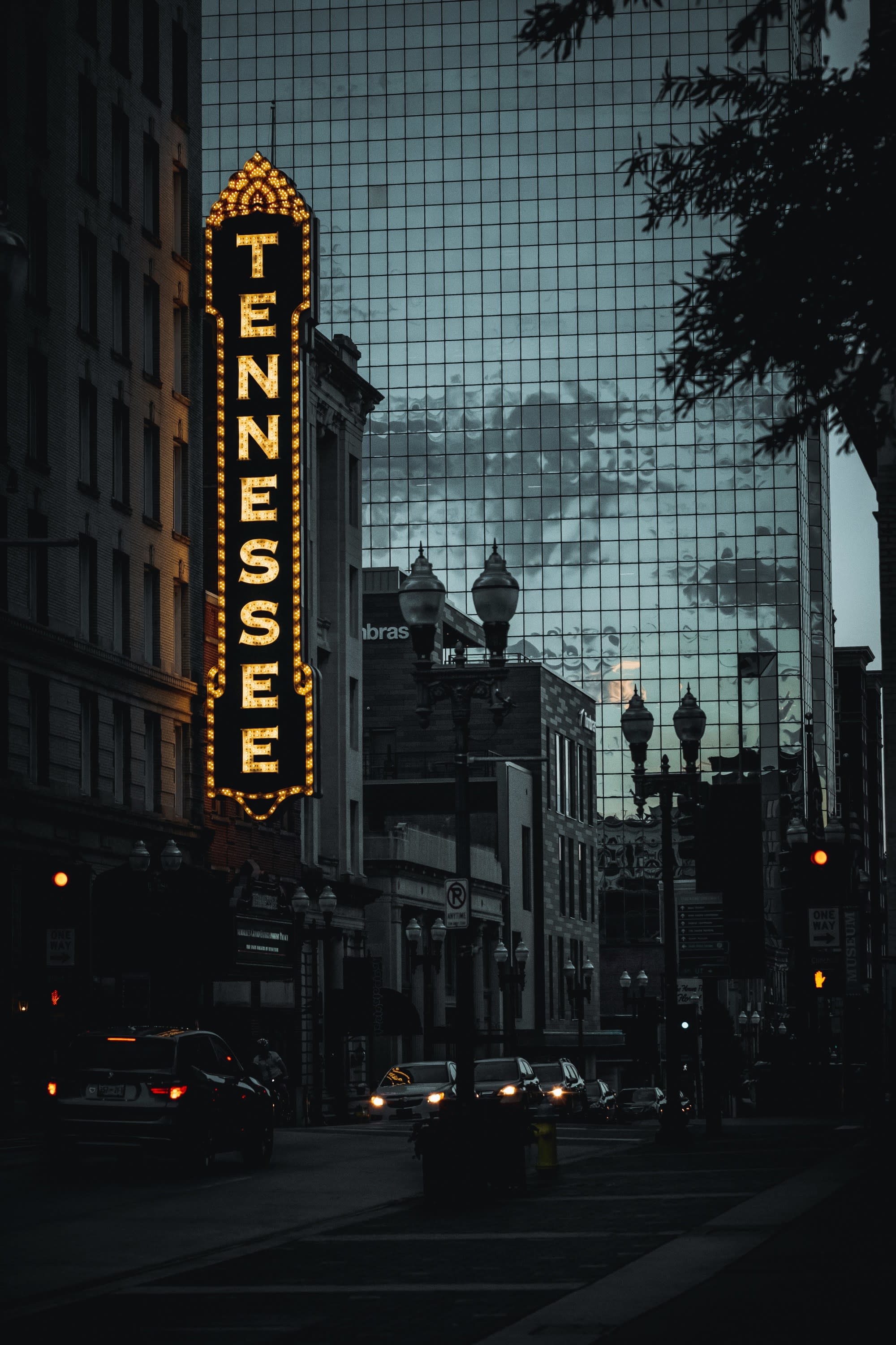 A lit-up sign reading "Tennessee" during the nighttime
