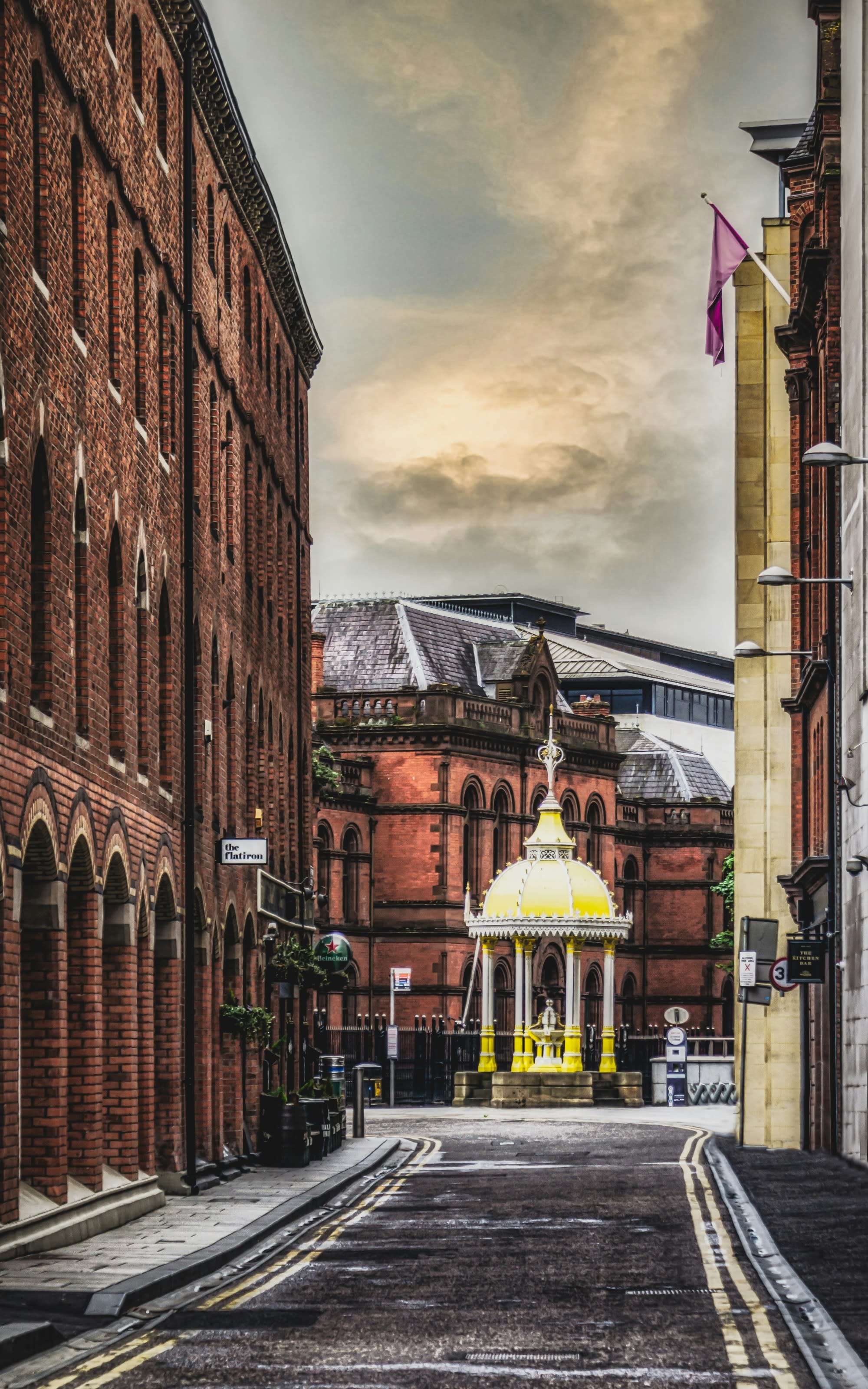 A street between buildings.