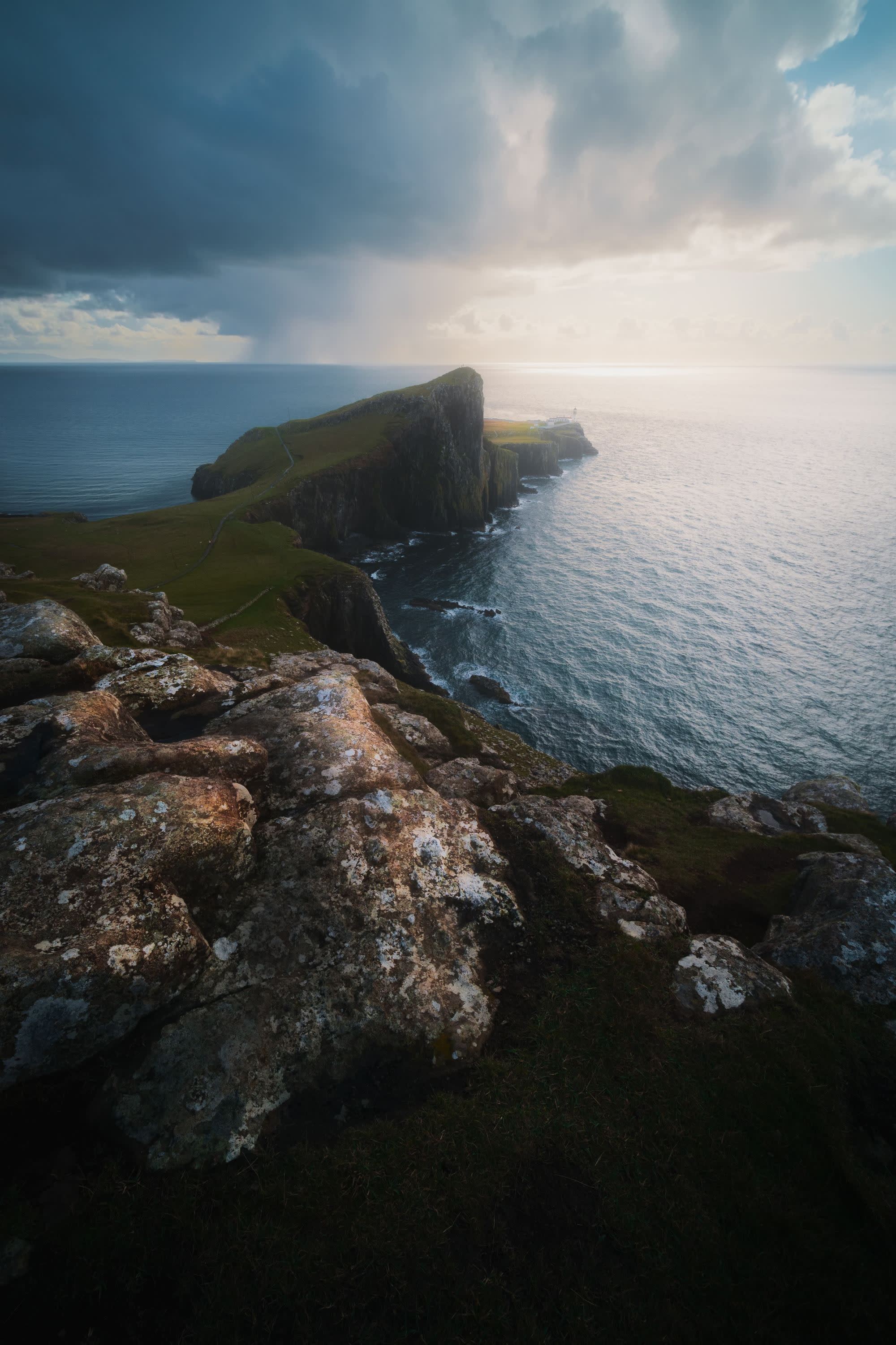 Green ocean shore on a cloudy day.