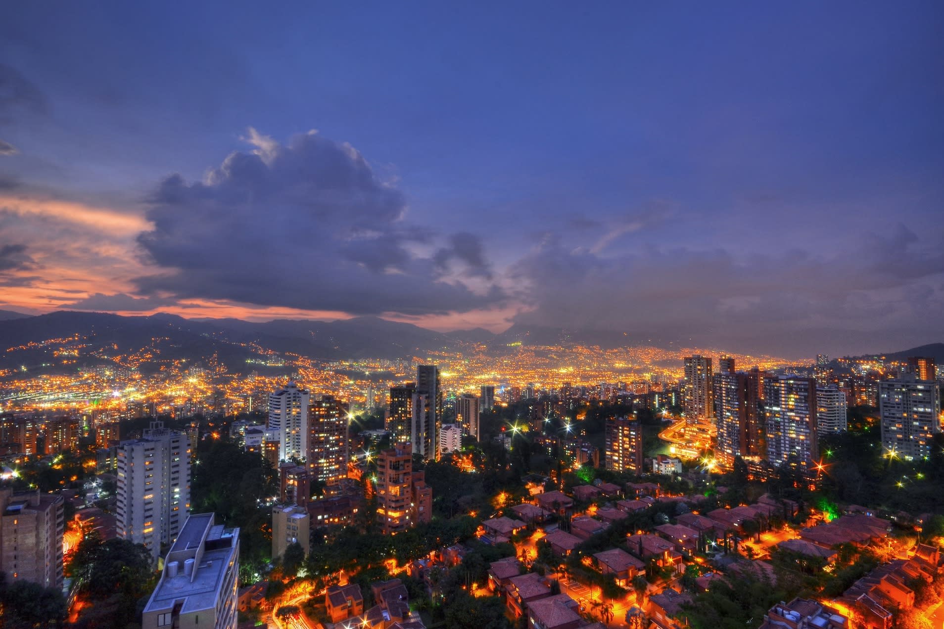 Aerial view of city at night.