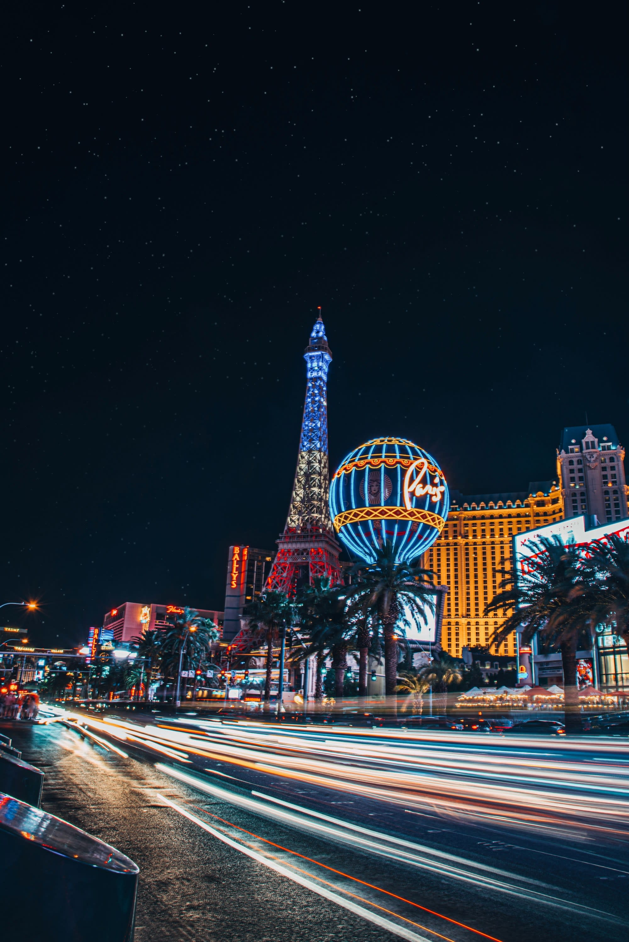 The Las Vegas strip at night with views of the Paris hotel.