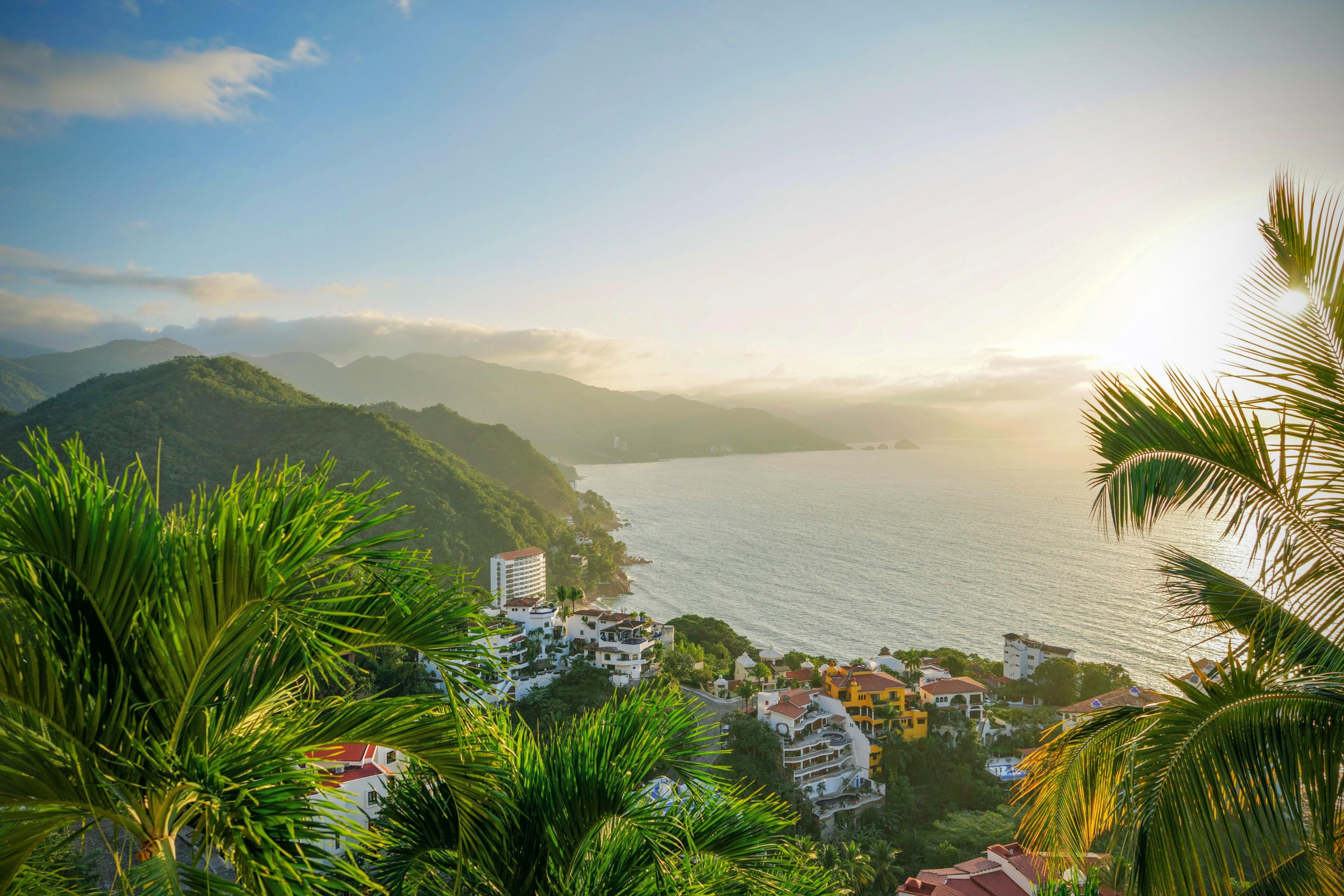 overlooking mountains and the ocean during sunset