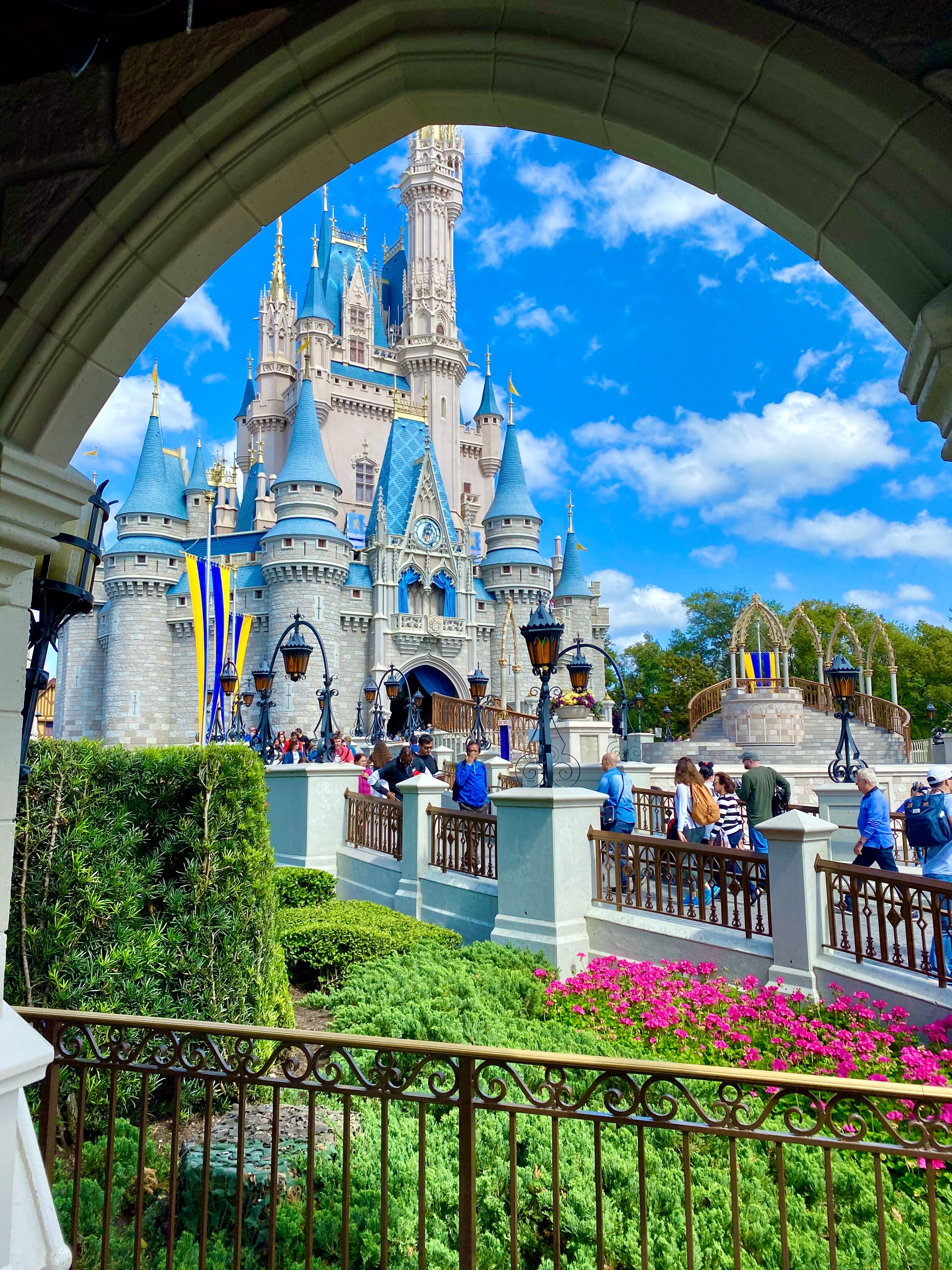 View of a castle and plants with blue skies during daytime