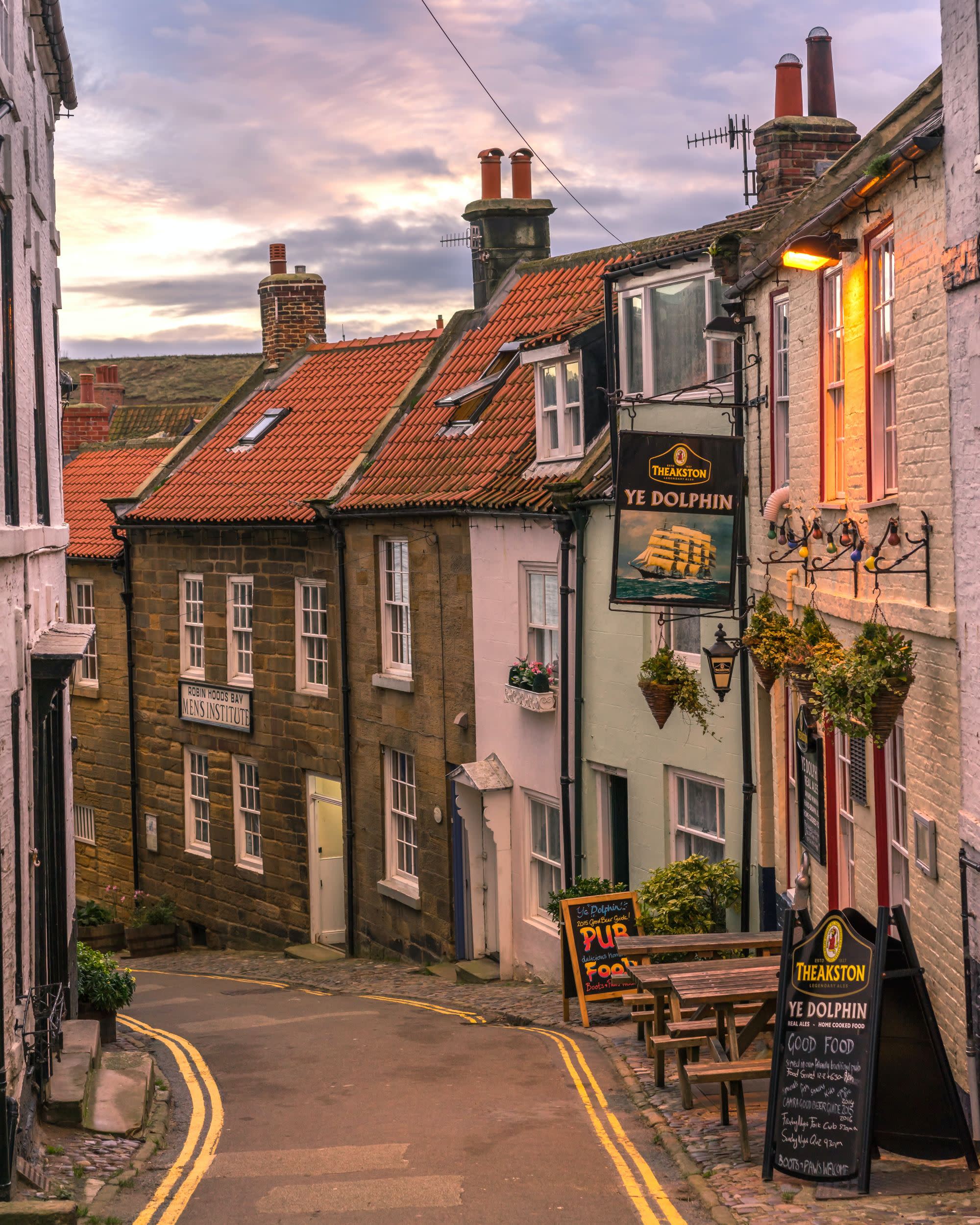 A picture of a row oh houses during the daytime