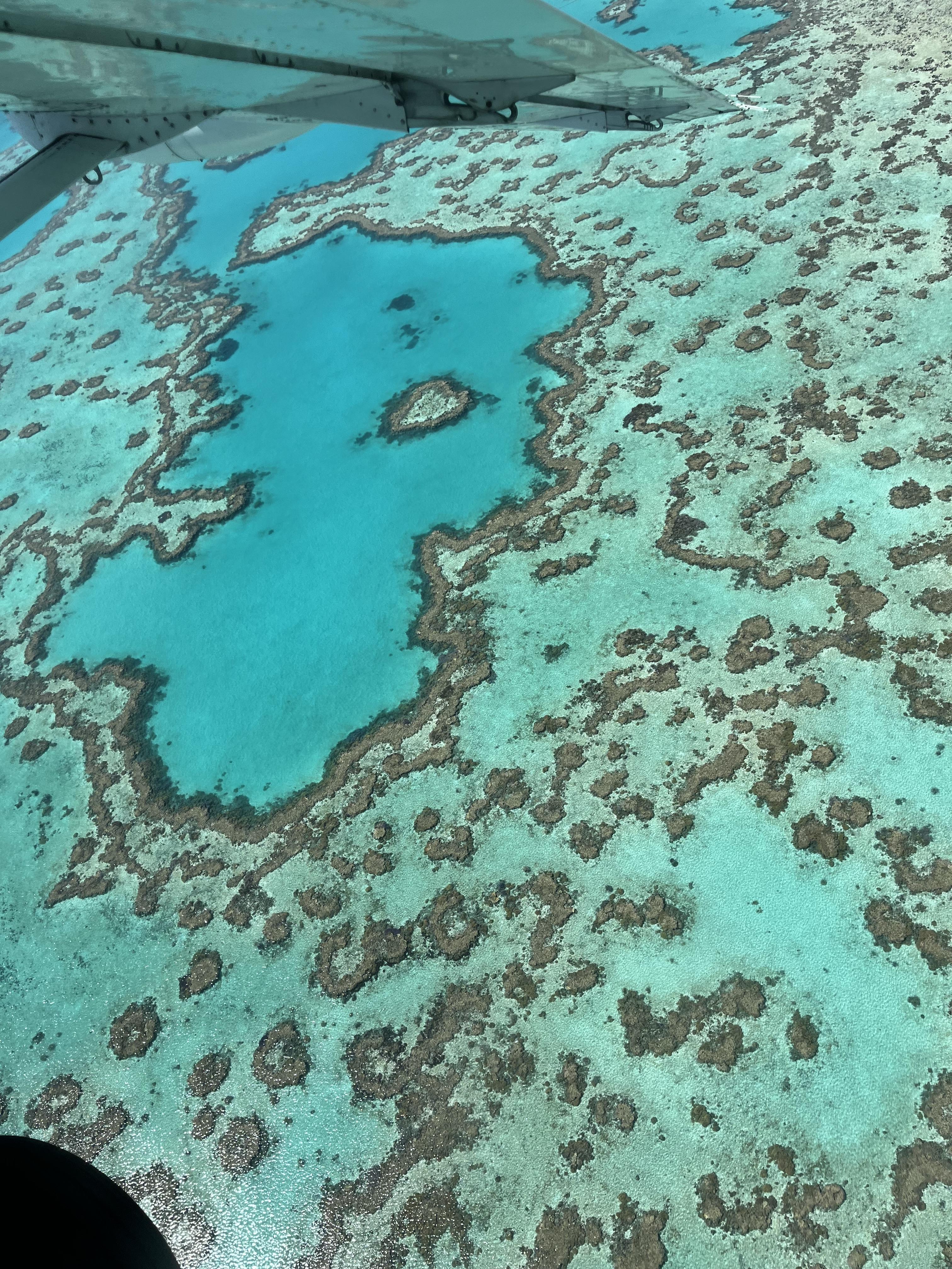 Areal view of an Island with bright blue water