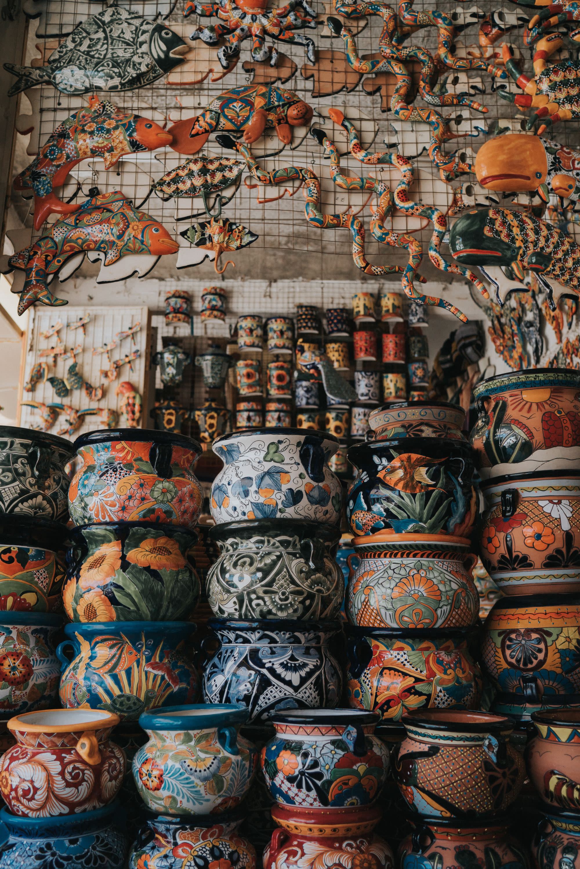 A picture of assorted-color clay pots.