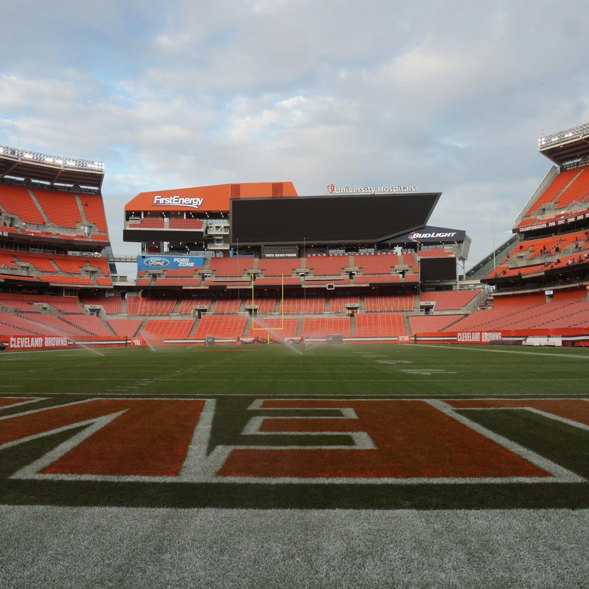The image presents an empty FirstEnergy Stadium from field level, highlighting the end zone and stands with visible branding.