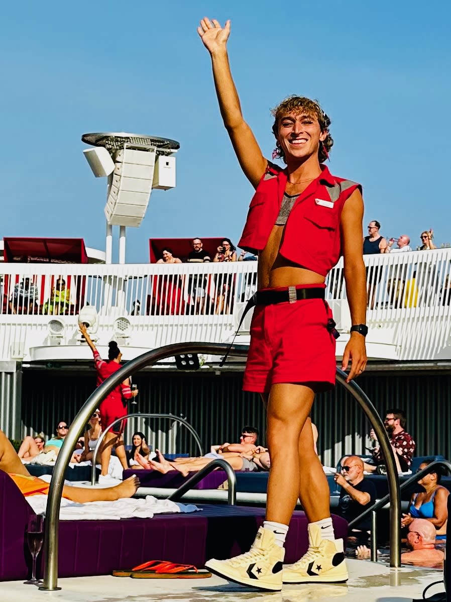 A crew member from the Sail Away Party in Virgin Voyages.