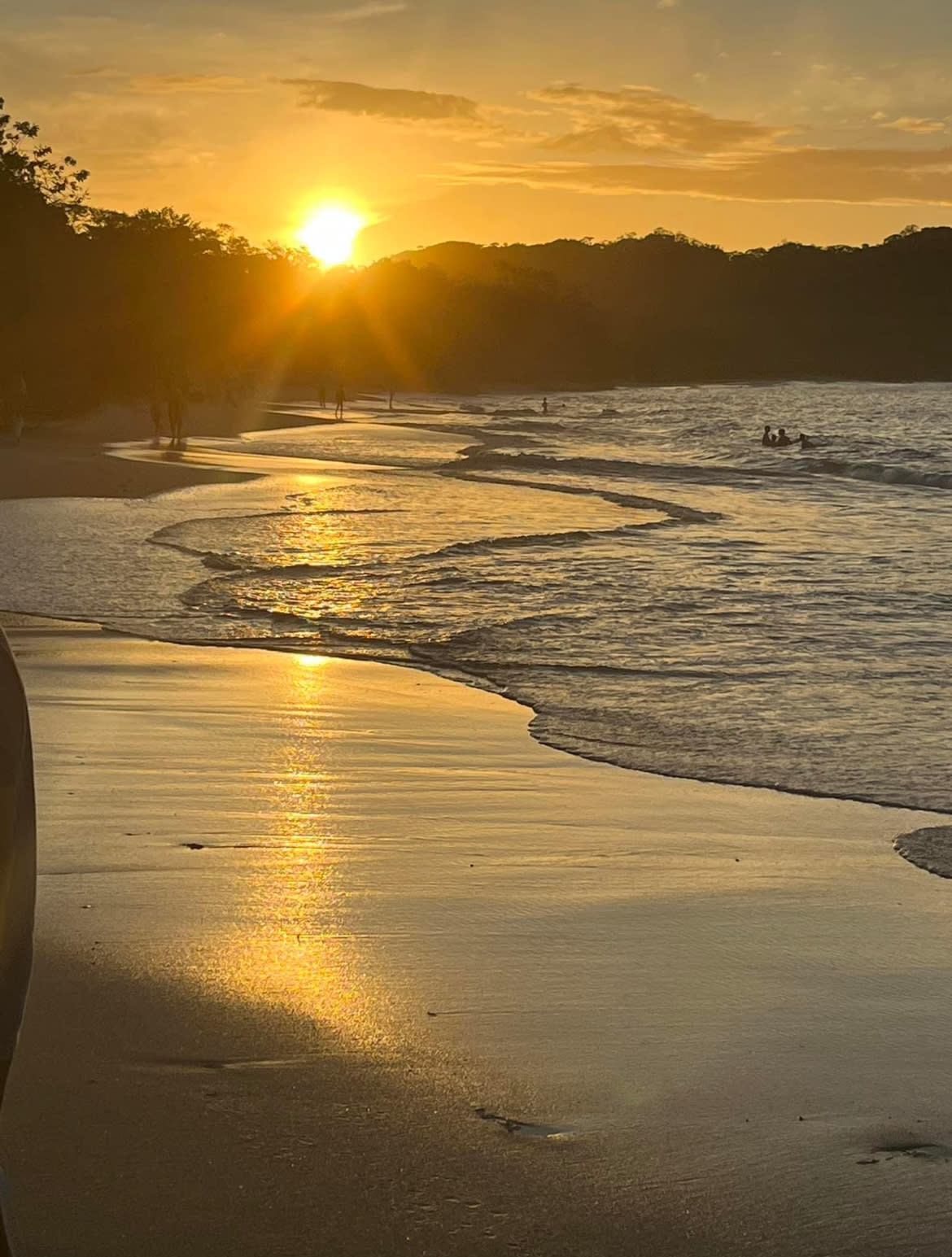 A golden sunset over a Costa Rican beach.