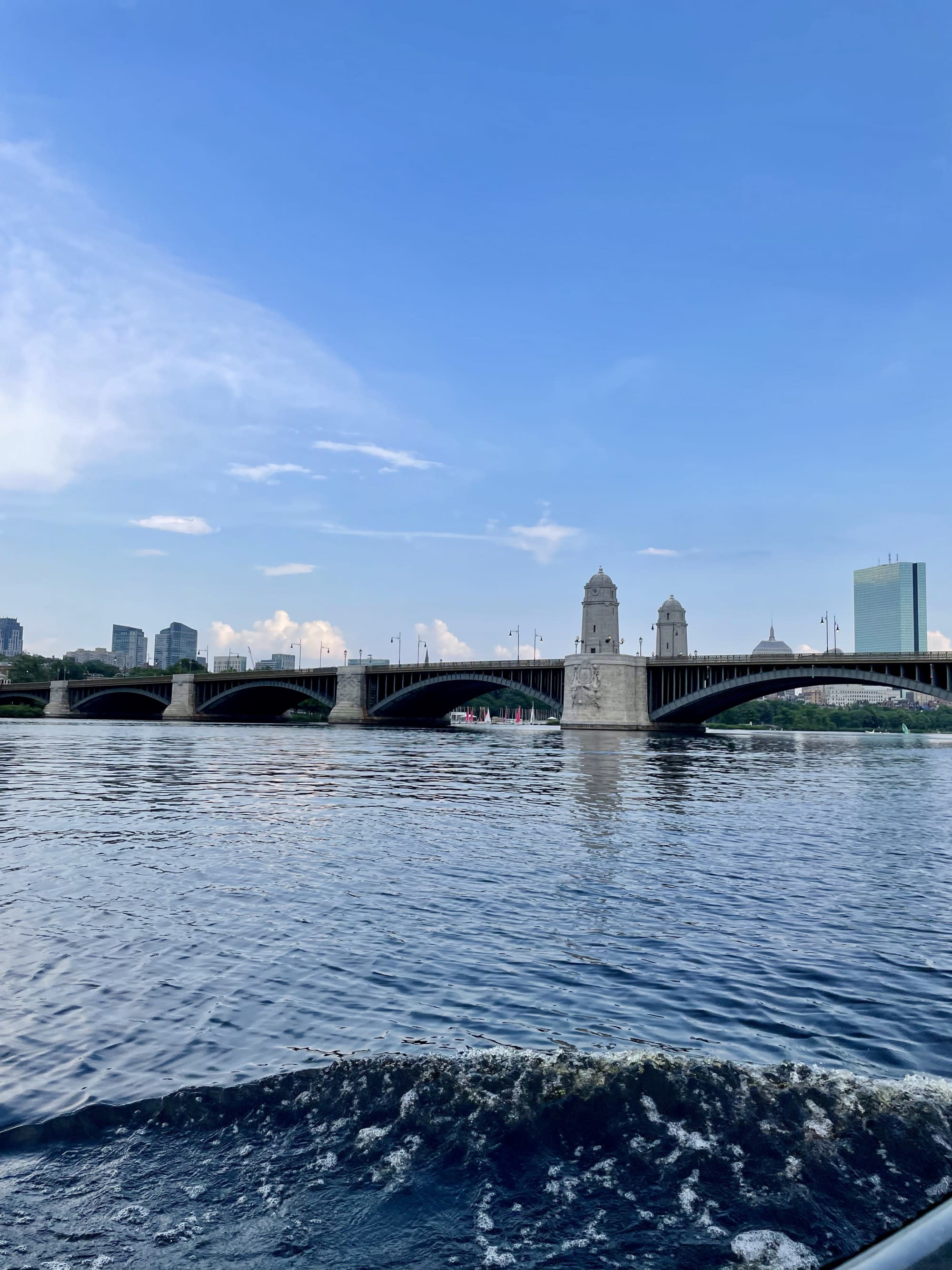 A picture of water under the bridge during the daytime.