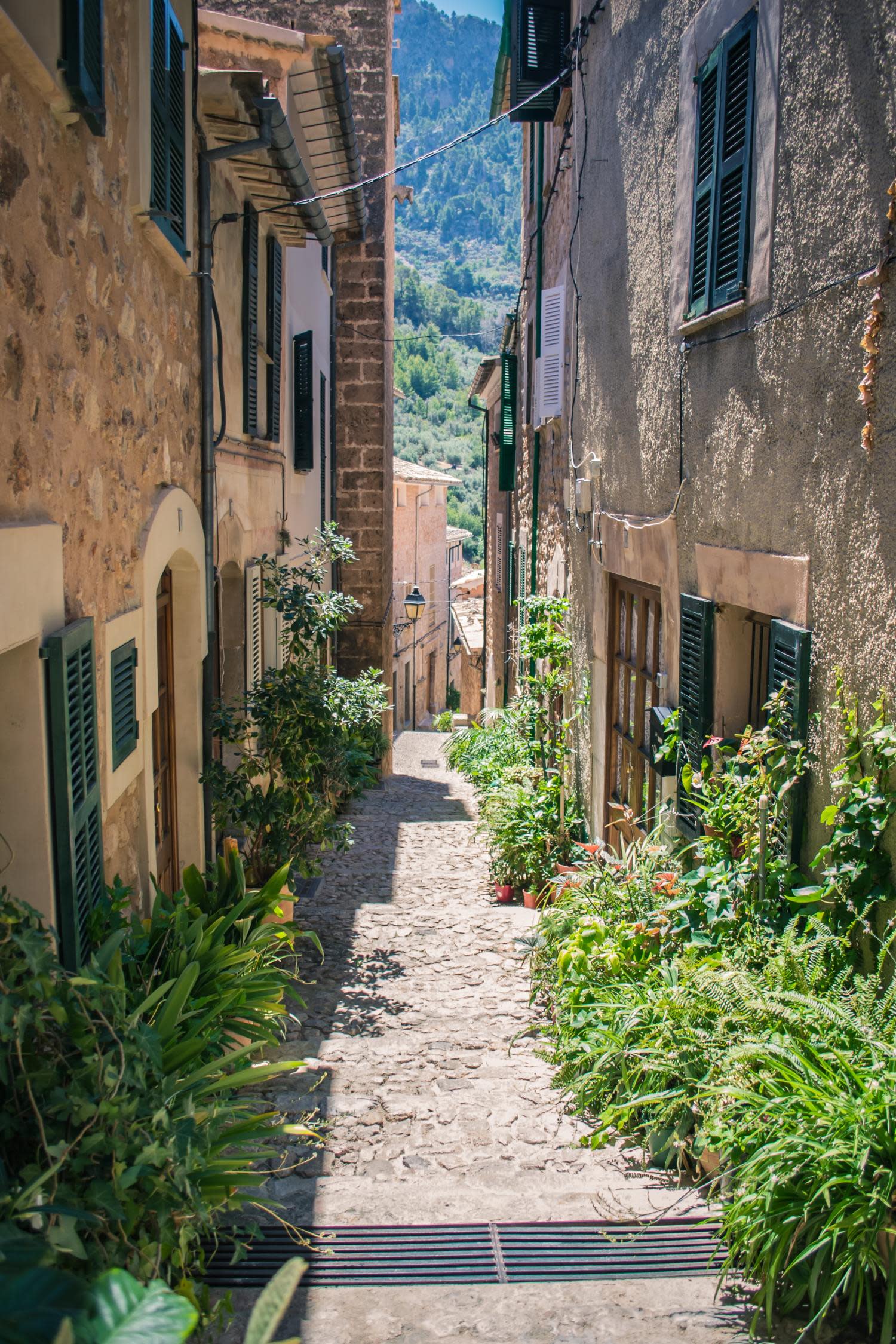 Alleyway of Fornalutx in village of Mallorca on sunny day.